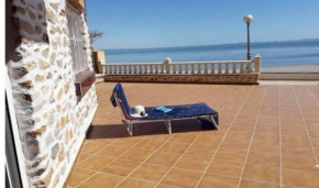 Beachfront apartment with Patio & Private Terrace